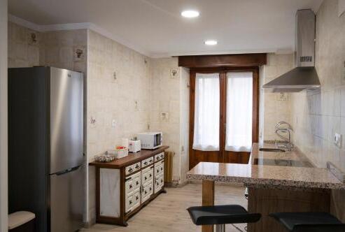 Foto de una habitación de Tres Puentes Anguiano Apartamentos &amp;amp; Habitaciones