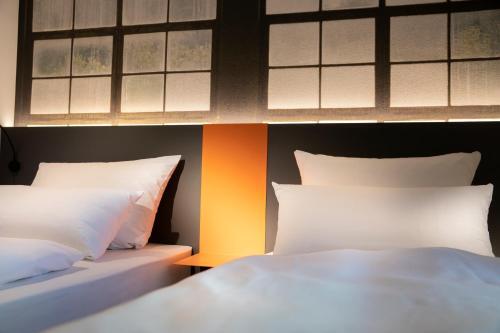 Foto de una habitación de LOGINN Hotel Waiblingen