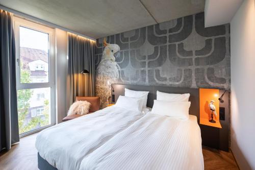 Foto de una habitación de LOGINN Hotel Waiblingen