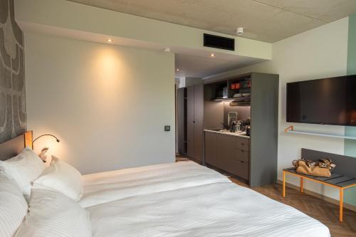 Foto de una habitación de LOGINN Hotel Waiblingen