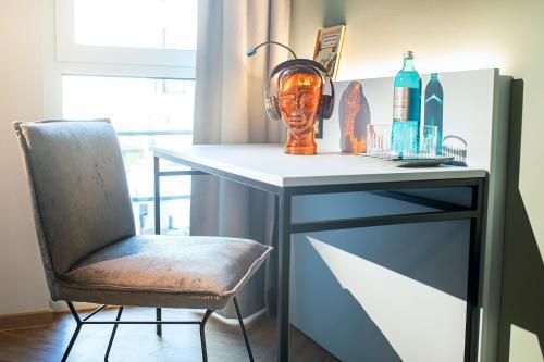 Foto de una habitación de LOGINN Hotel Waiblingen