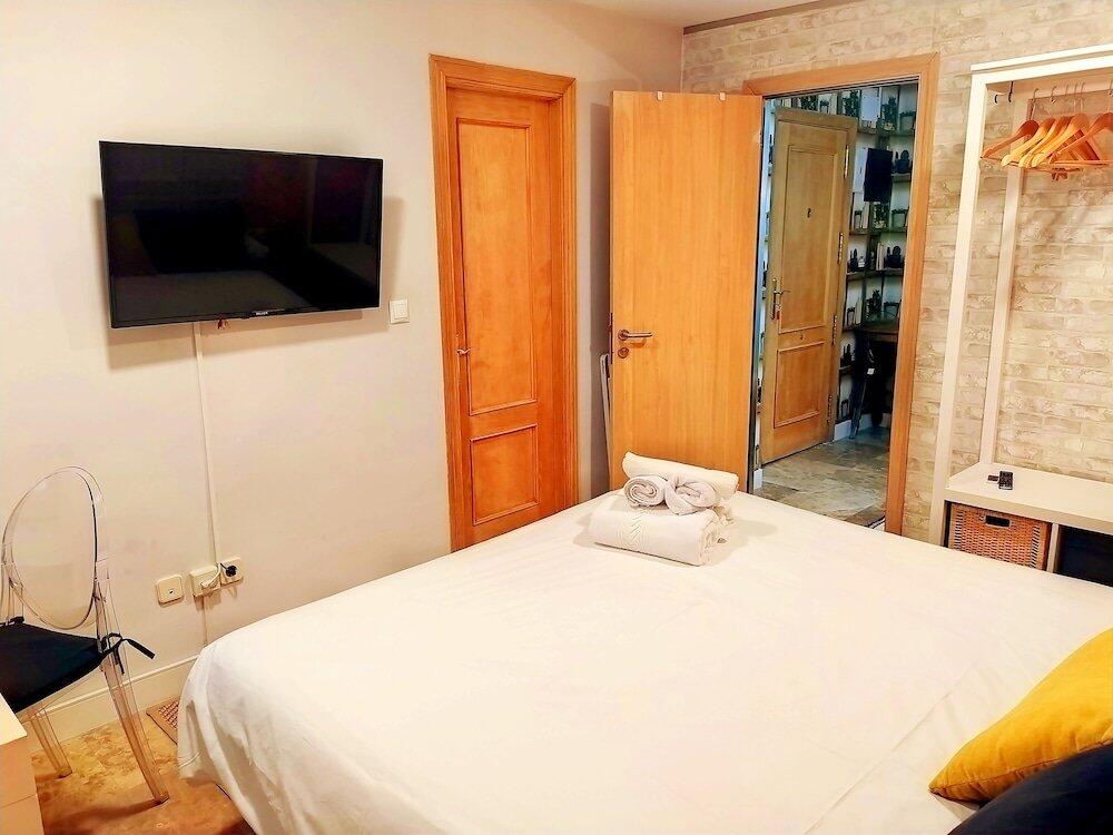 Foto de una habitación de HA Apartahotel Quo Eraso