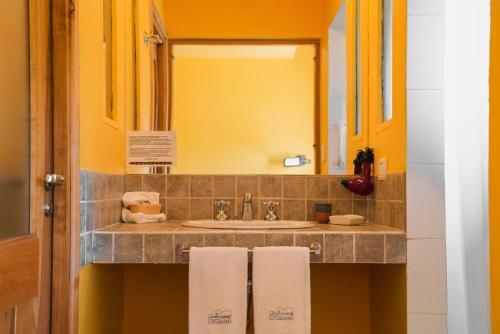 Foto del baño de Challhuaquen Lodge