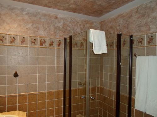Foto del baño de Hotel El Doncel