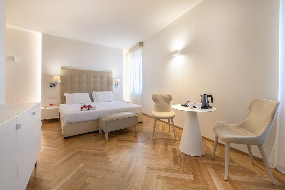 Foto de una habitación de Asisium Boutique Hotel