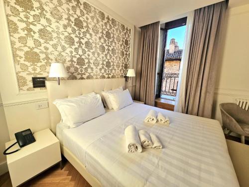 Foto de una habitación de Asisium Boutique Hotel