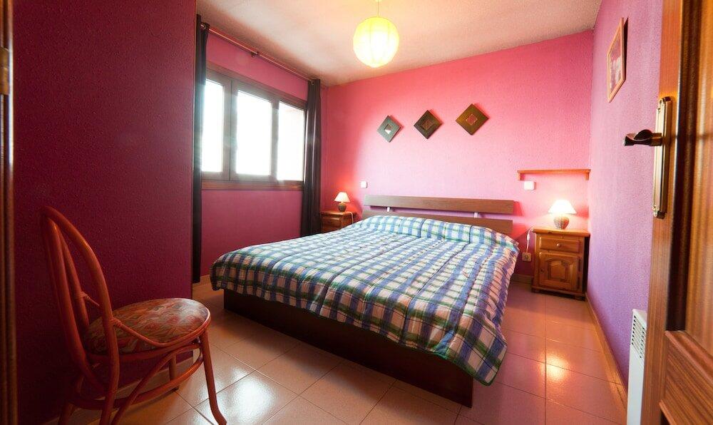 Foto de una habitación de Apartaments Turistics Natural Suites Manzano 3000