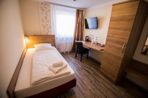 Foto de una habitación de Hotel Heisede