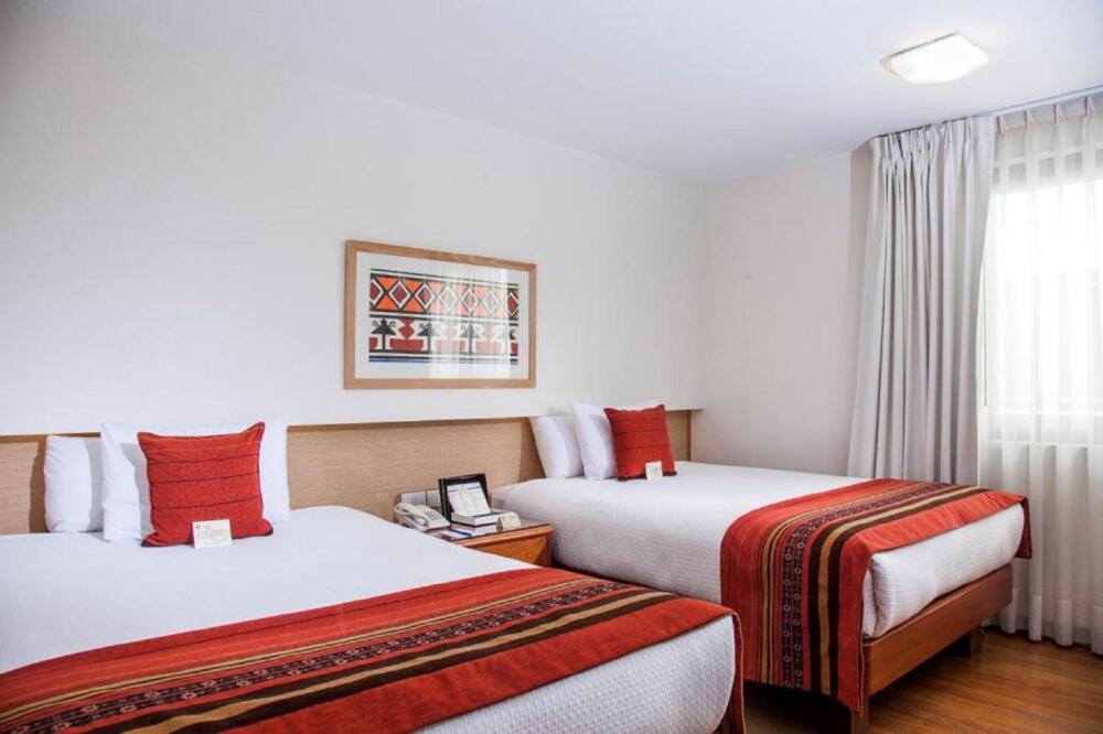 Foto de una habitación de Hotel San Agustin Plaza