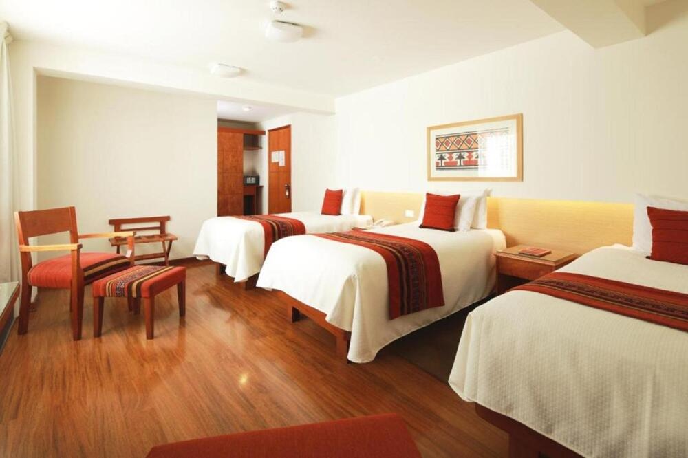 Foto de una habitación de Hotel San Agustin Plaza