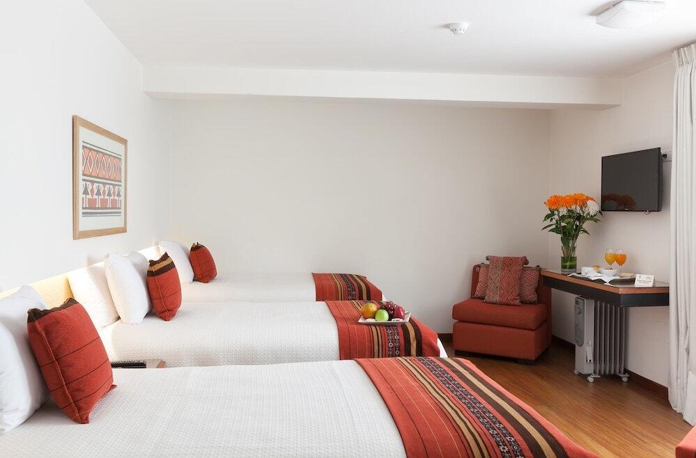 Foto de una habitación de Hotel San Agustin Plaza