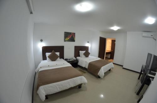 Foto de una habitación de Hotel Pinares Plaza