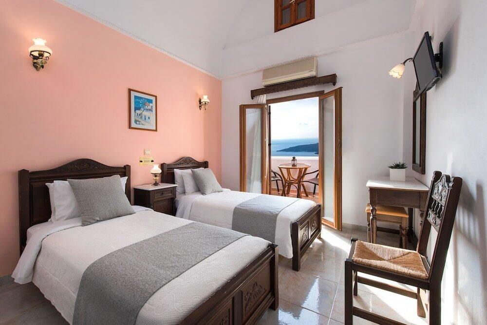 Foto de una habitación de Astir Thira Hotel