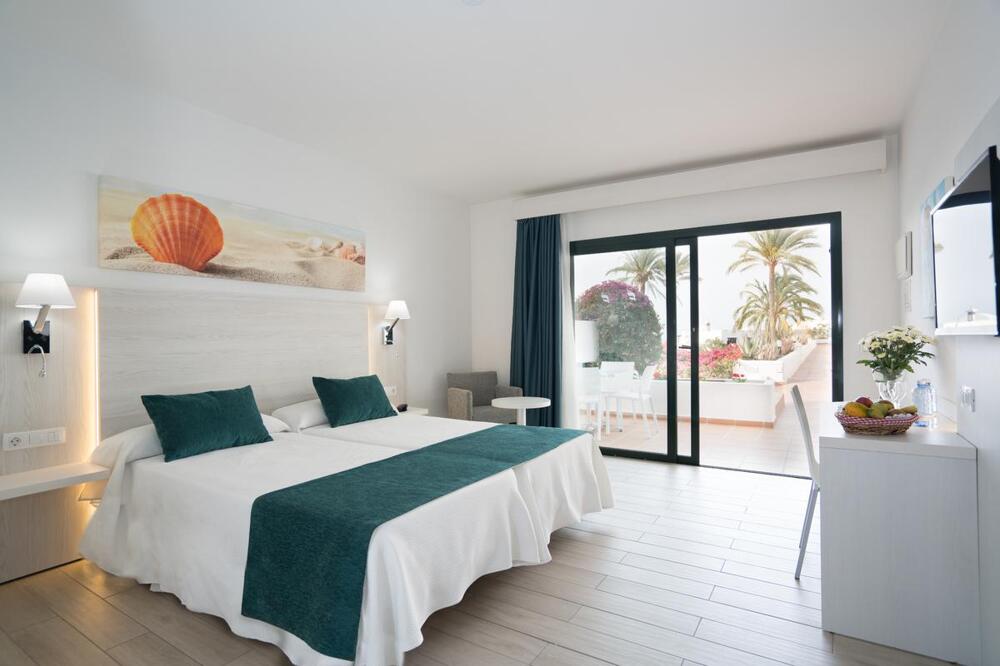 Foto de una habitación de Hotel THB Flora