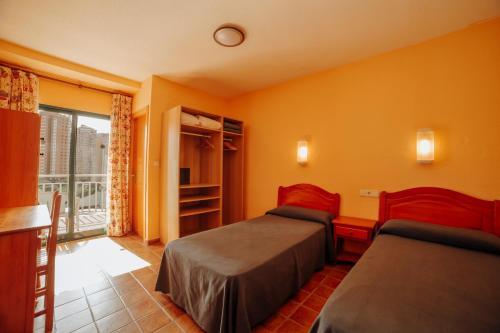 Foto de una habitación de Apartamentos Palm Court
