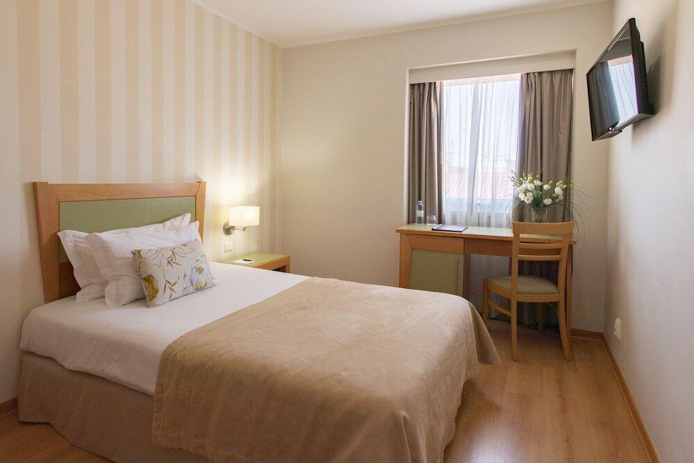 Foto de una habitación de Luna Esperanca Centro Hotel