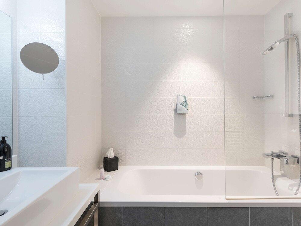 Foto de una habitación de Aparthotel Adagio Paris 19ème Cité de la Musique