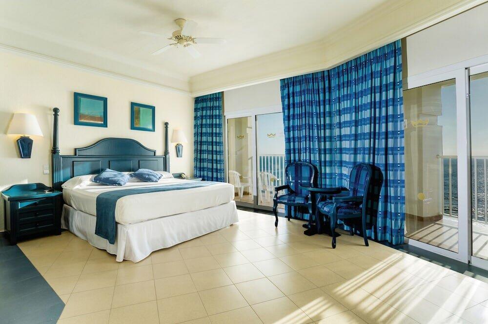 Foto de una habitación de Hotel Riu Emerald Bay All Inclusive