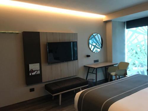 Foto de una habitación de Hotel City Express Plus Merida