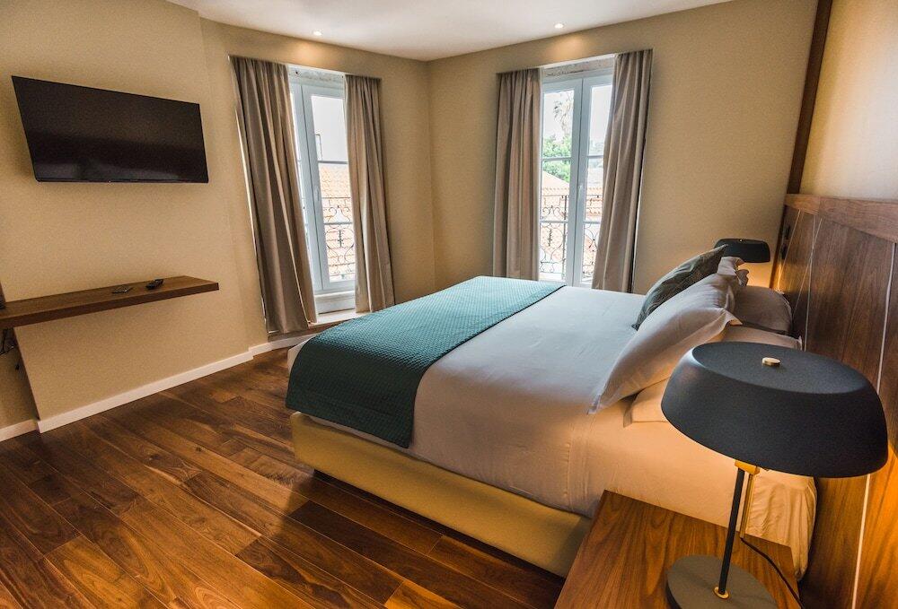 Foto de una habitación de Rossio Boutique Hotel