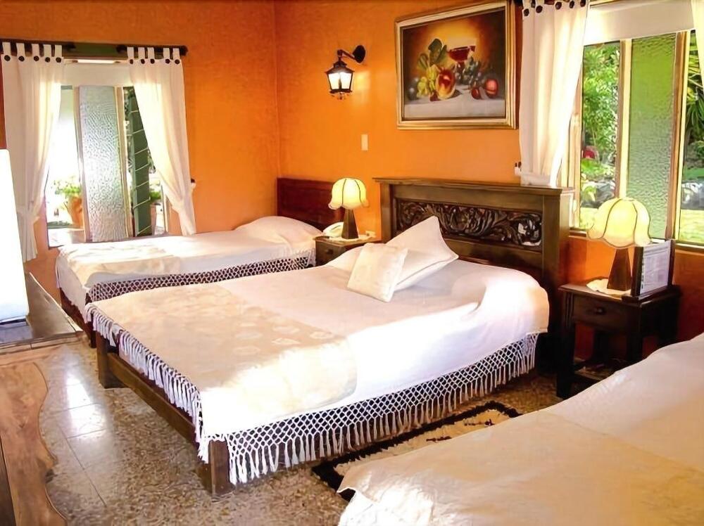 Foto de una habitación de Hotel Iguaque Campestre Spa &amp;amp; Ecolodge