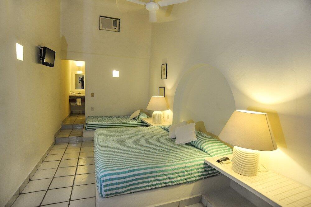 Foto de una habitación de Hotel Suites Ixtapa Plaza