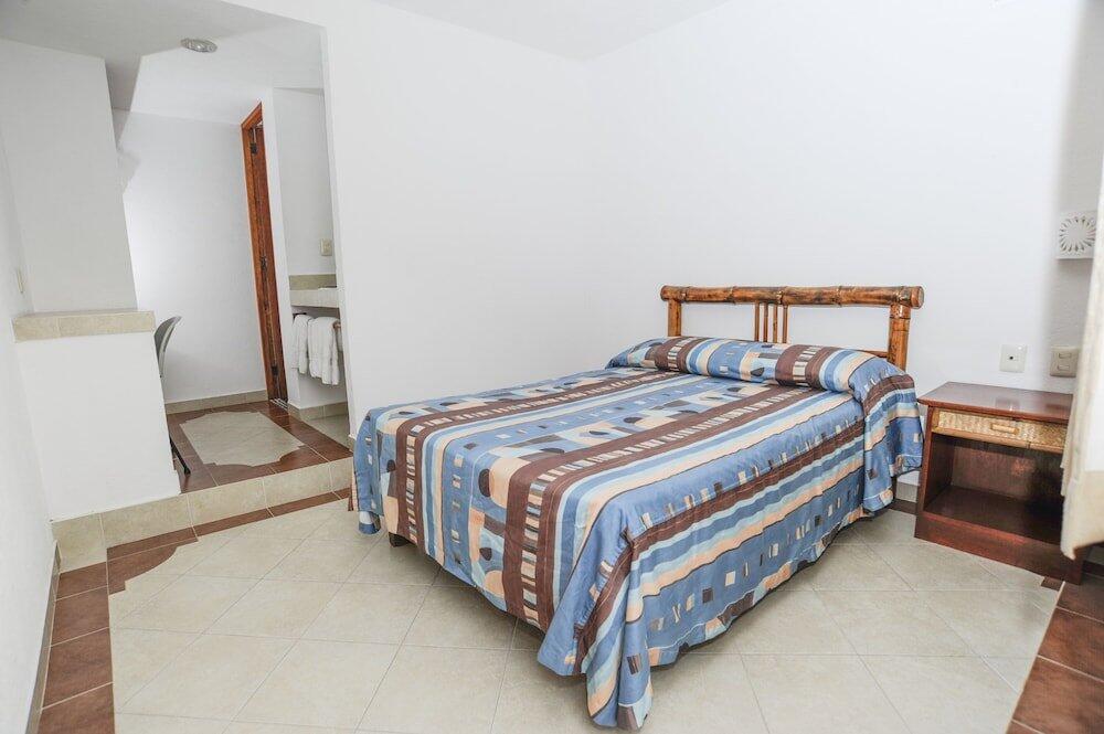 Foto de una habitación de Hotel Suites Ixtapa Plaza