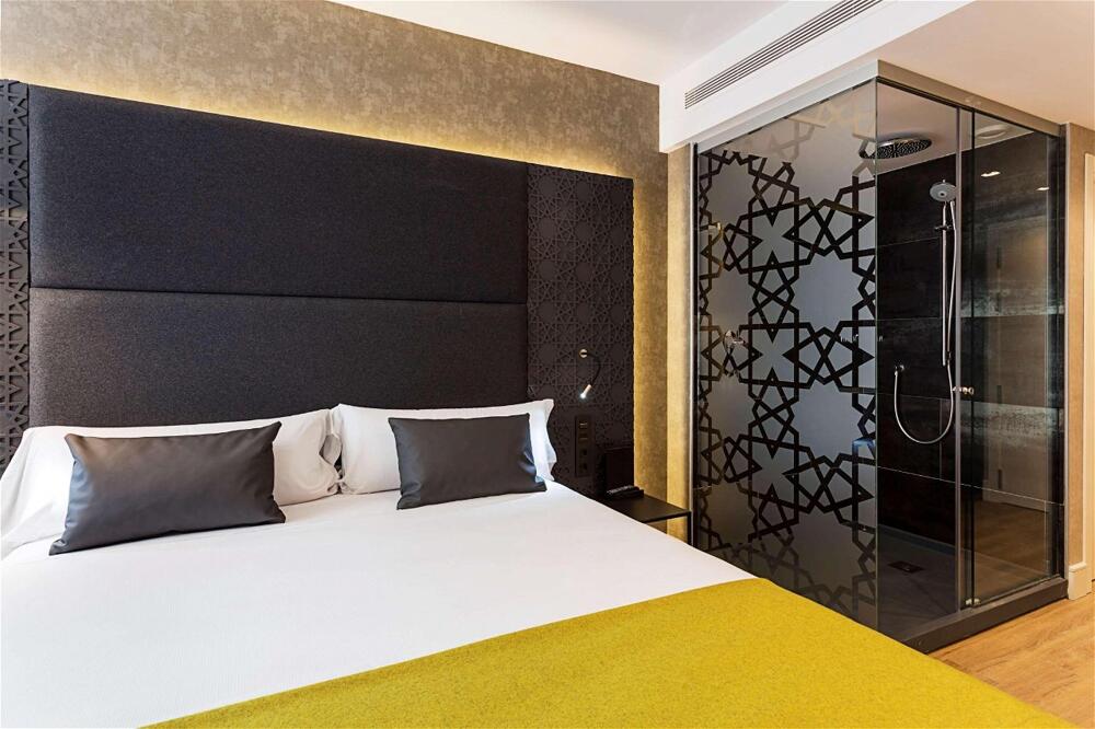 Foto de una habitación de Hotel Catalonia Giralda