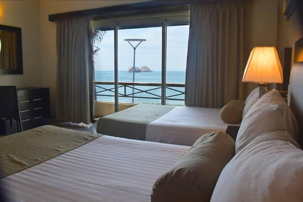 Foto de una habitación de Hotel La Siesta
