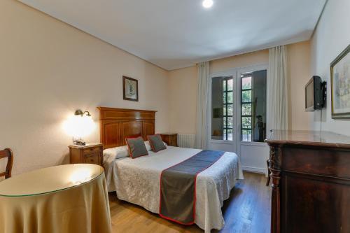 Foto de una habitación de Hotel Santillana