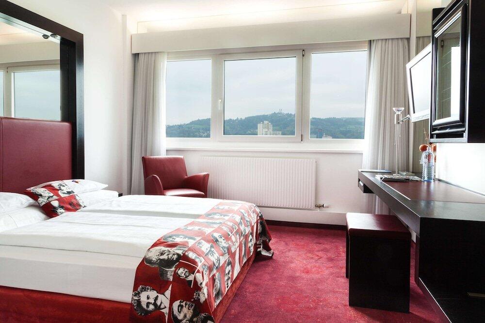 Foto de una habitación de Hotel ARCOTEL Nike Linz