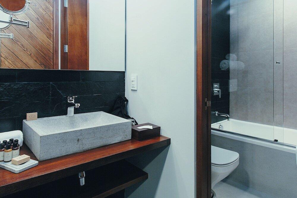 Foto del baño de Atix Hotel