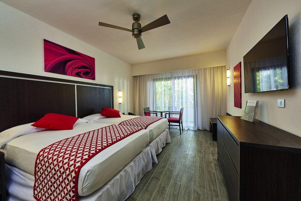 Foto de una habitación de Aparthotel Riu Tequila - All Inclusive