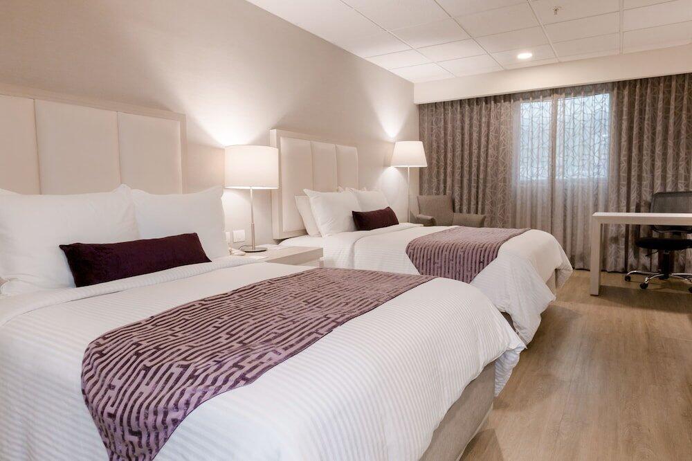 Foto de una habitación de Hotel Antaris Galerías