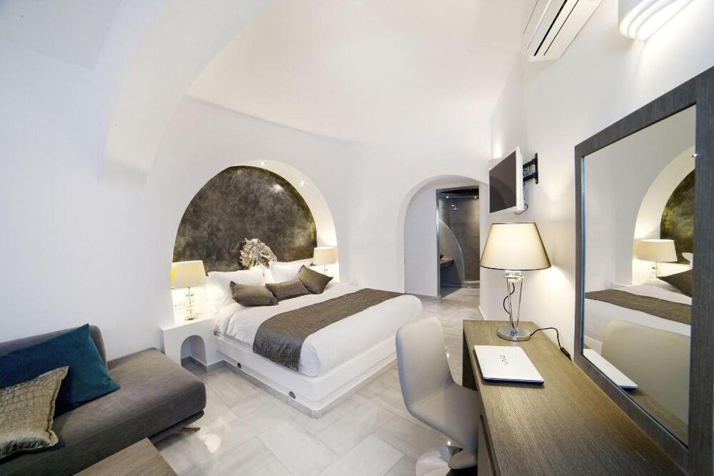 Foto de una habitación de Hotel Anteliz Suites