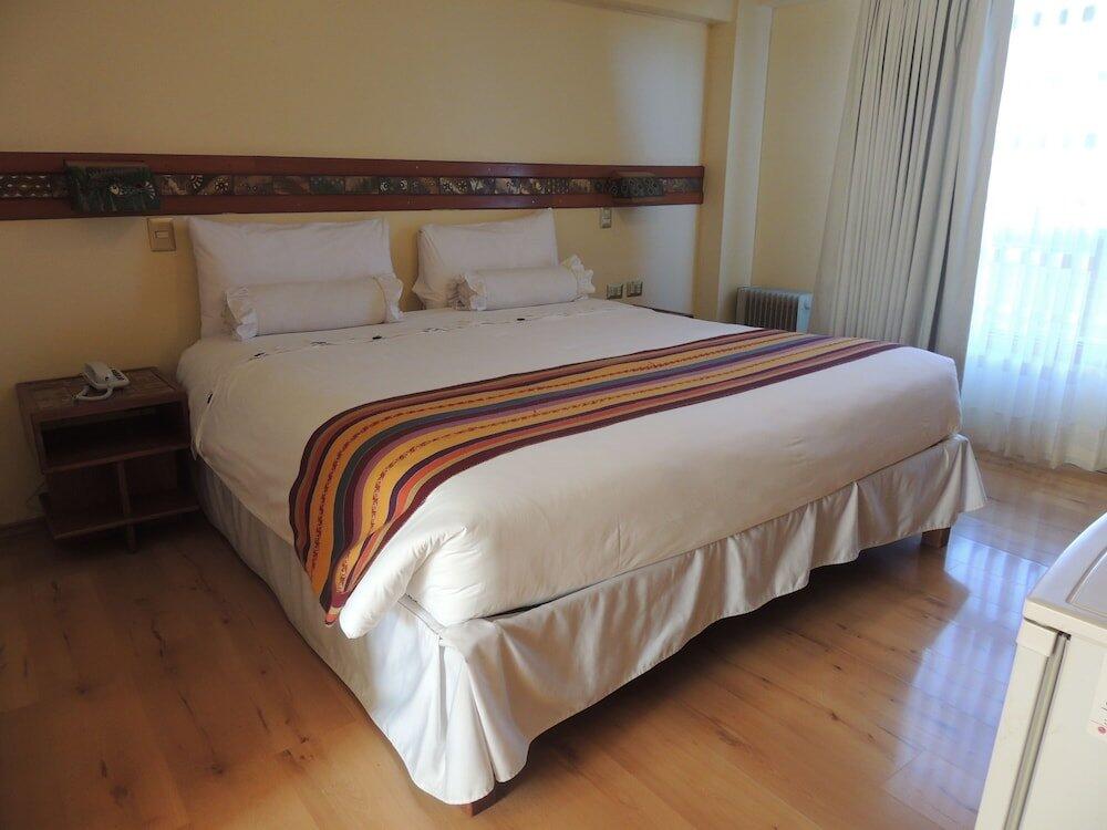 Foto de una habitación de Taypikala Hotel Cusco