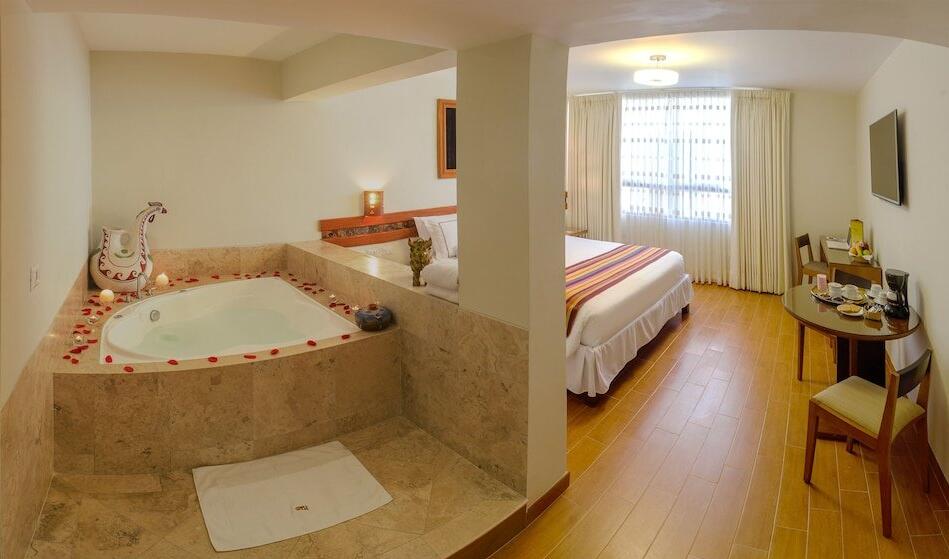 Foto de una habitación de Taypikala Hotel Cusco