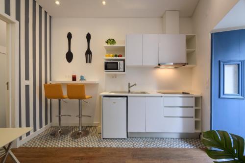 Foto de una habitación de Apartamentos Alfama Yellow House