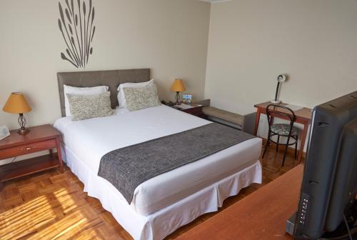 Foto de una habitación de Hotel Embassy Quito