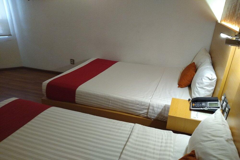 Foto de una habitación de Hotel Villa Del Sol Expo