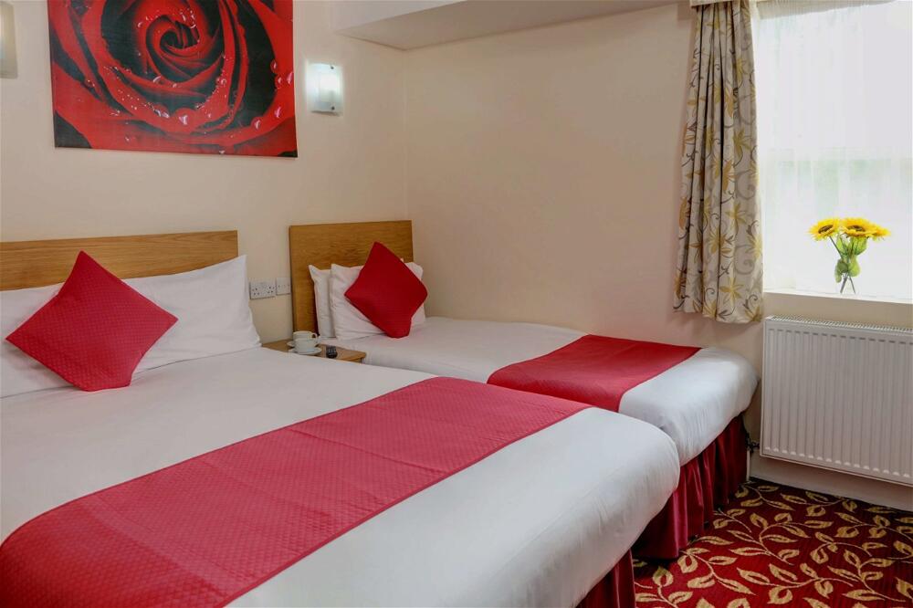 Foto de una habitación de Best Western Greater London Hotel