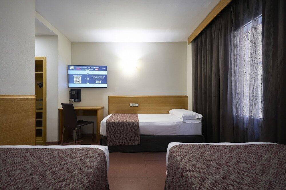 Foto de una habitación de Hotel Catalonia Park Güell
