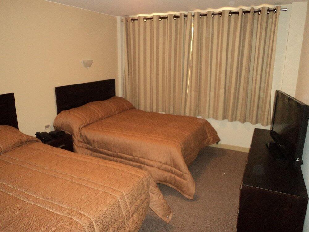 Foto de una habitación de Los Sauces Apart Hotel