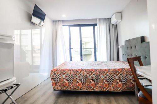 Foto de una habitación de Hotel Avenida
