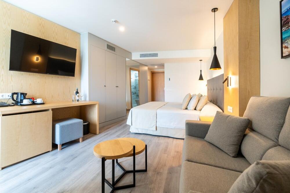 Foto de una habitación de HL Rondo Hotel