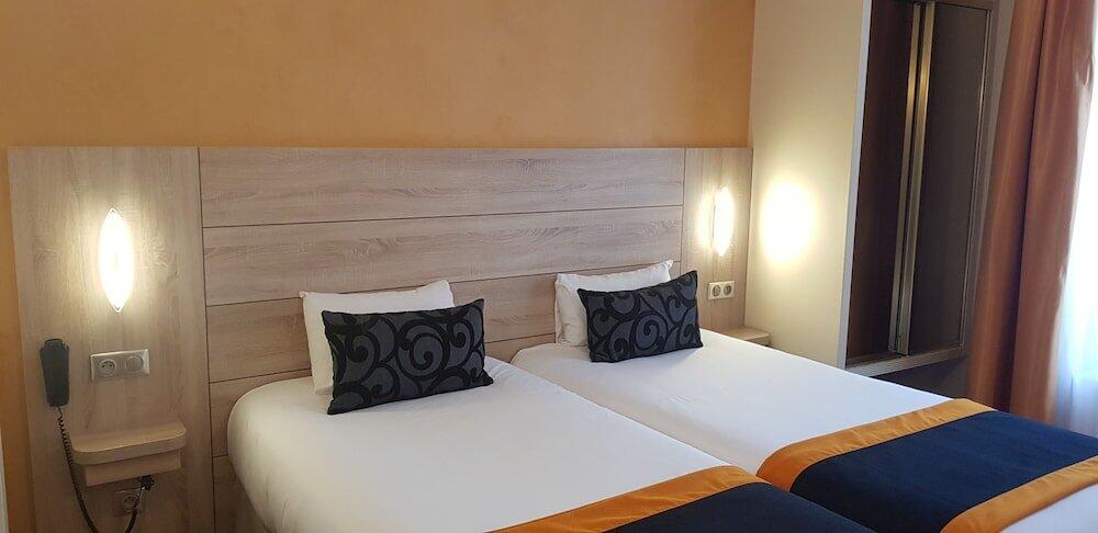 Foto de una habitación de Hotel Champerret Elysees