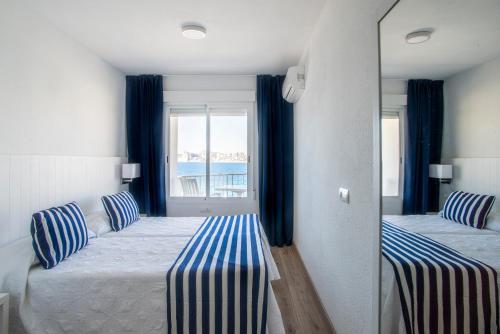 Foto de una habitación de Apartamentos La Mar