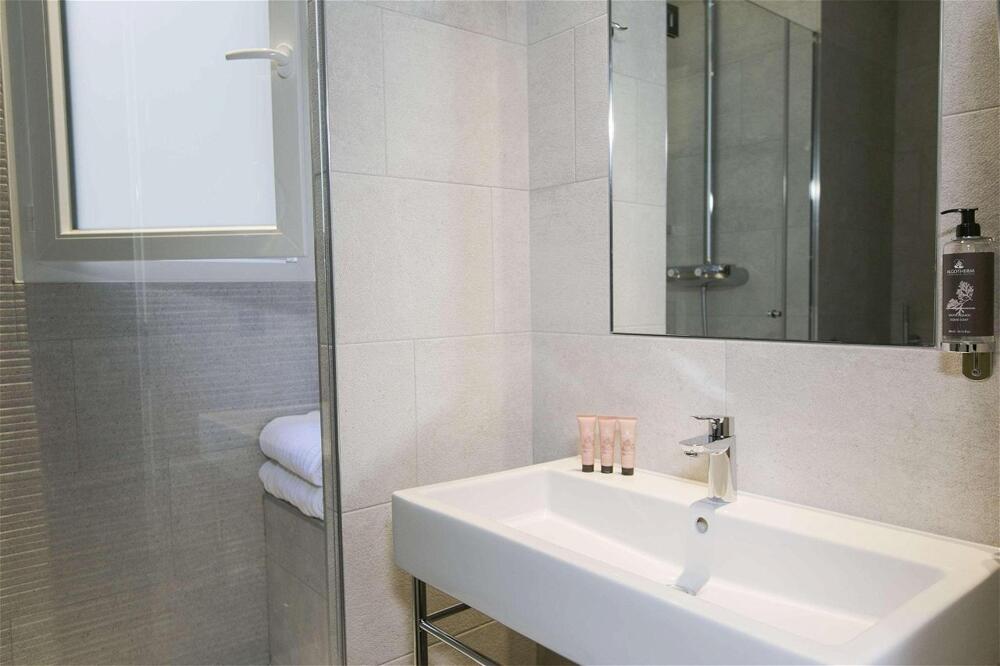 Foto del baño de Hotel de Neuville Arc de Triomphe