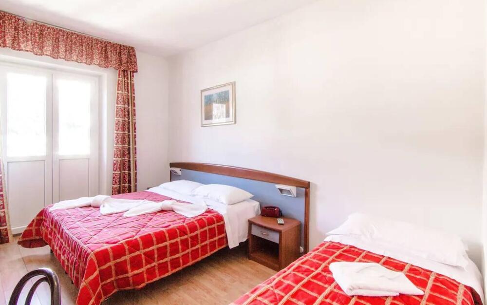 Foto de una habitación de Hotel Excelsior Cimone