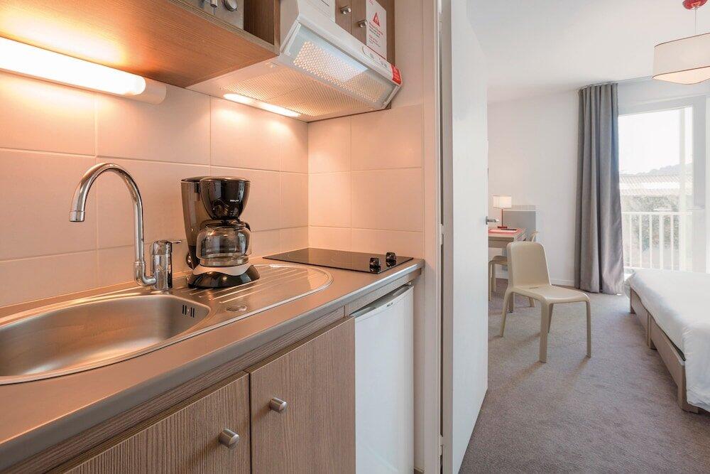 Foto de una habitación de Appart&amp;#039;City Confort Cherbourg